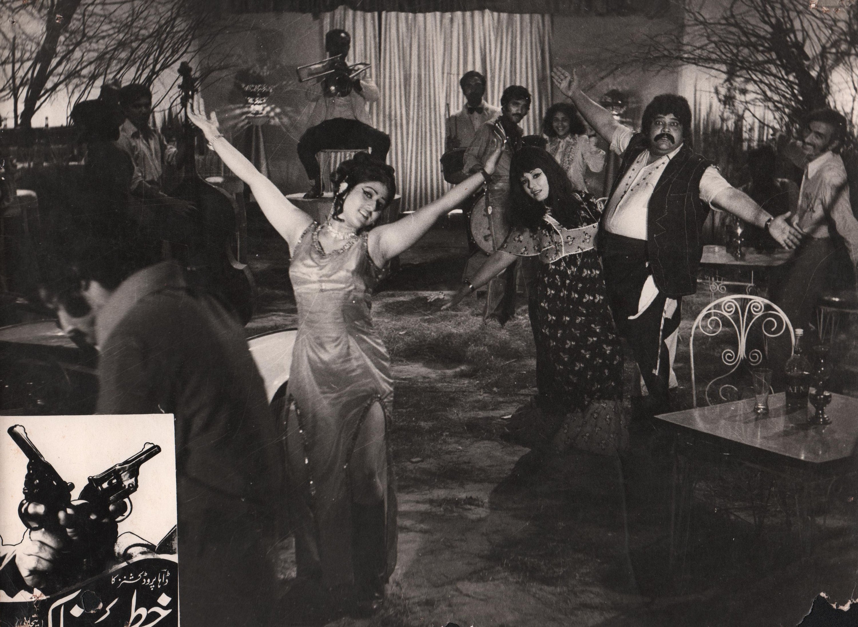 Vintage black-and-white scene of people dancing in a lively club, Khajistan archive style.